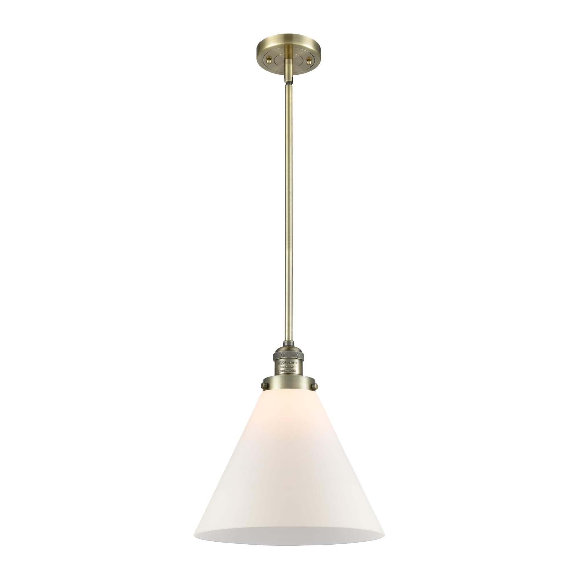 Shown in Antique Brass finish and Matte White Cased glass