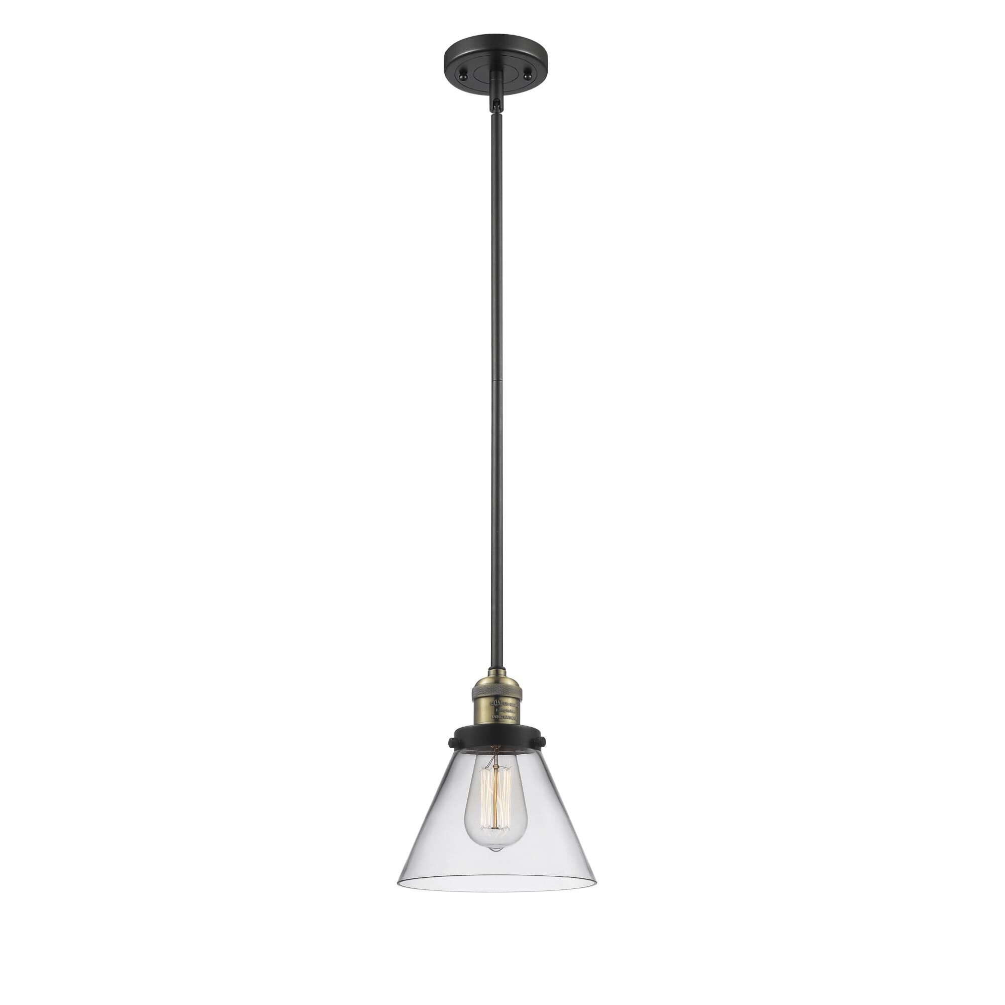 Shown in Black Brushed Brass finish and Clear glass