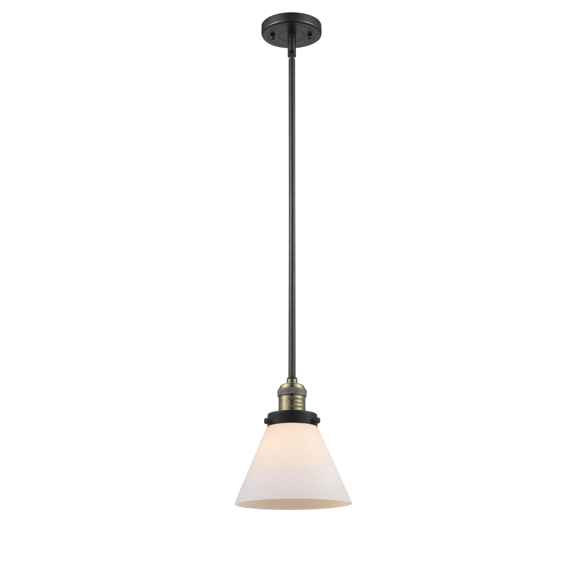 Shown in Black Brushed Brass finish and Matte White Cased glass