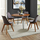Shop Round Wooden Dining Table with Gray Chairs at Bellacor