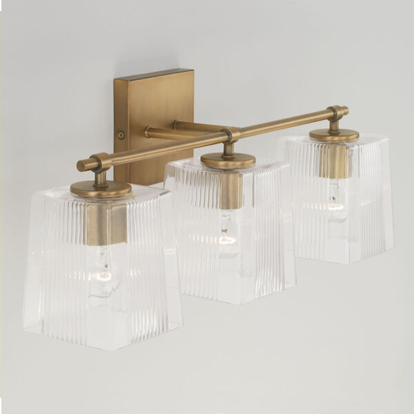 Lexi Aged Brass Three-Light Bath Vanity with Clear Fluted Square Glass Shades, image 4