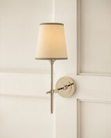 <p>Bryant Wall Sconce in Polished Nickel and Linen Shade with Silver Trim</p>