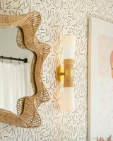 <p>Micah Wall Sconce in Aged Brass</p>